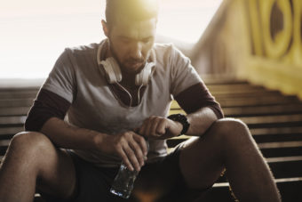 Picture of a young athletic man resting after training