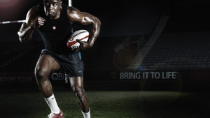 Rugby player training at night