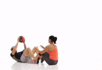Sit up with a medicine ball